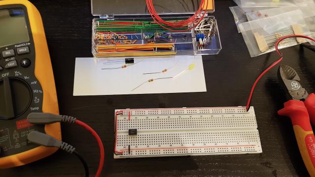 Put the 555 time on the board and wire up power