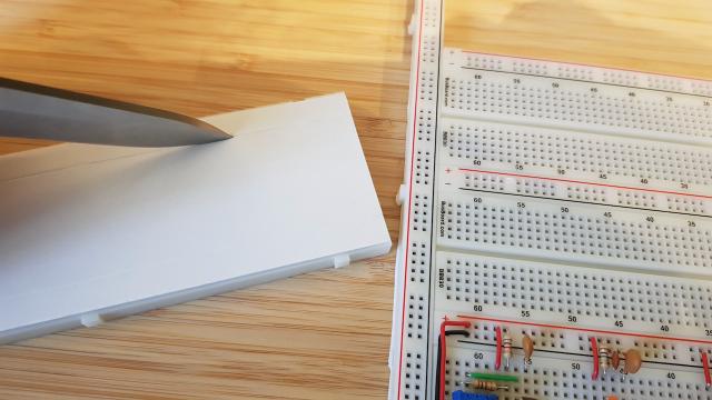 Cut one power rail of ever breadboard