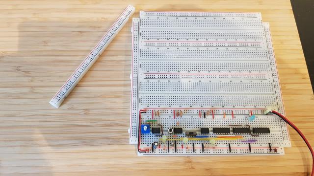 The cut off power rails go to the sides of the board